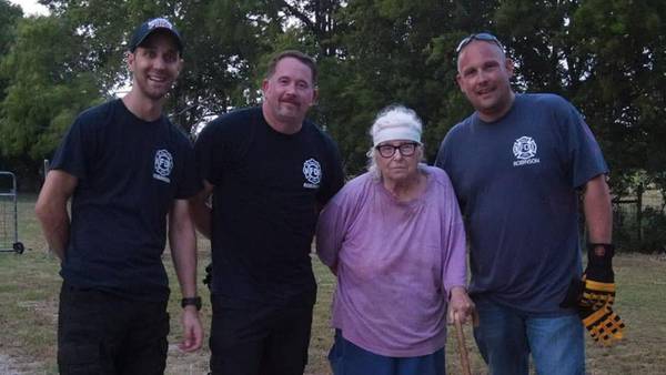 Texas firefighters do yard work for elderly woman