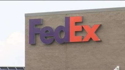 FedEx cuts management positions 