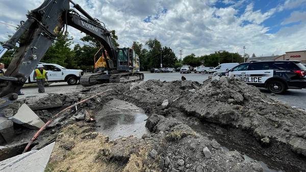 Police: Man causes $40K in damage to parking lot with stolen excavator