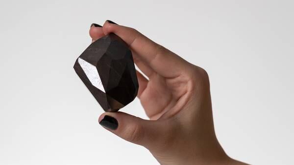 Photos: ‘The Enigma’ 555.55-carat black diamond