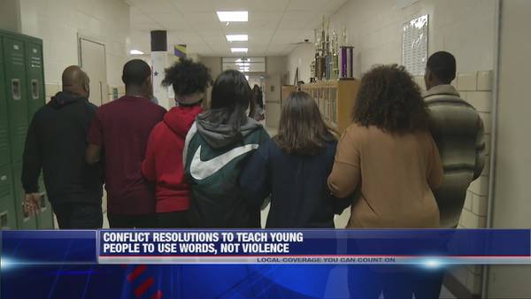 Students helping students with local school's intervention program