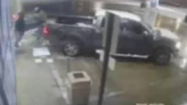 WATCH: Surveillance video shows thieves use truck to smash into business & steal ATM