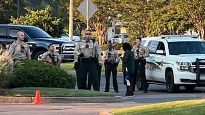 PHOTOS: Man with machete in standoff with SCSO deputies