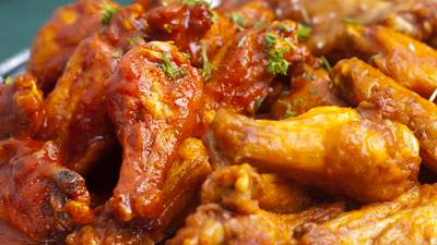 Chicken wings are cheaper but Super Bowl snacks remain ‘very expensive’  
